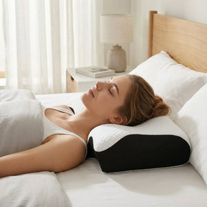 Person sleeping on their back with the cervical pillow supporting the neck