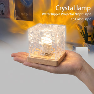 Compact palm-sized water ripple lamp held in hand