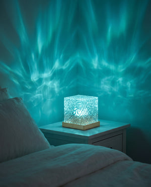 Aurora wave lamp casting cyan northern lights across a dark bedroom