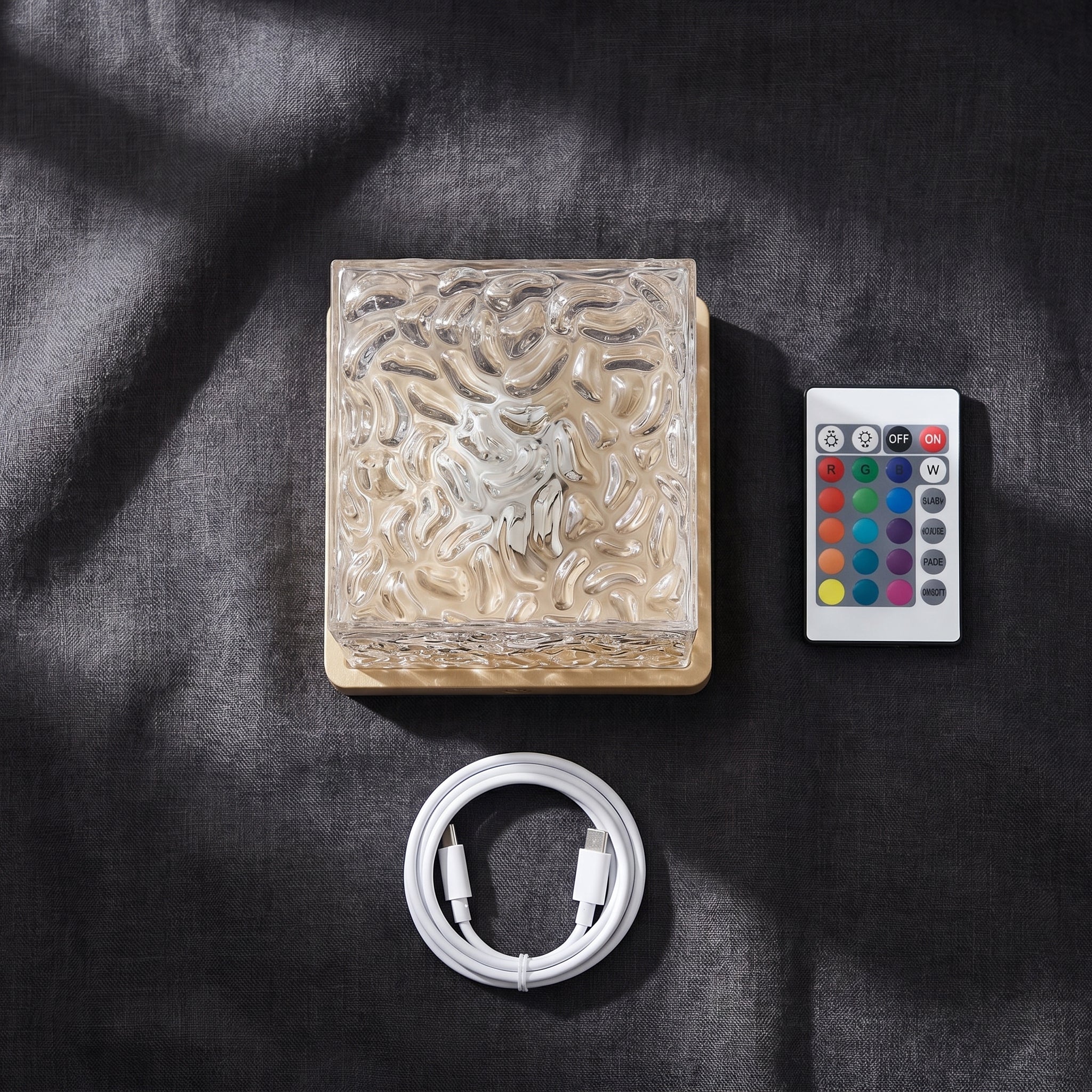 Aurora wave lamp with remote control and USB-C cable flat lay