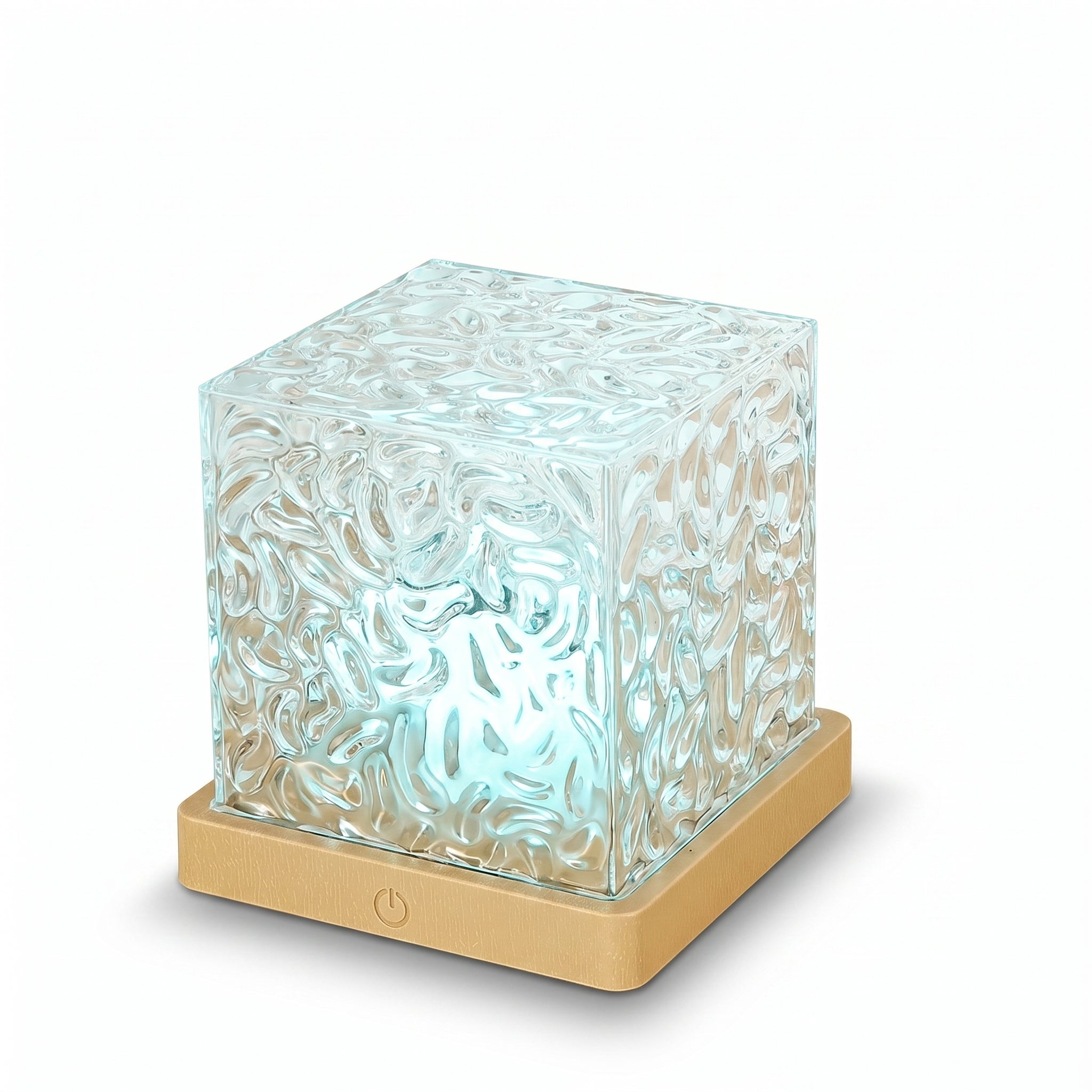 Aurora Wave Projection Lamp – clear acrylic cube on gold base, studio shot