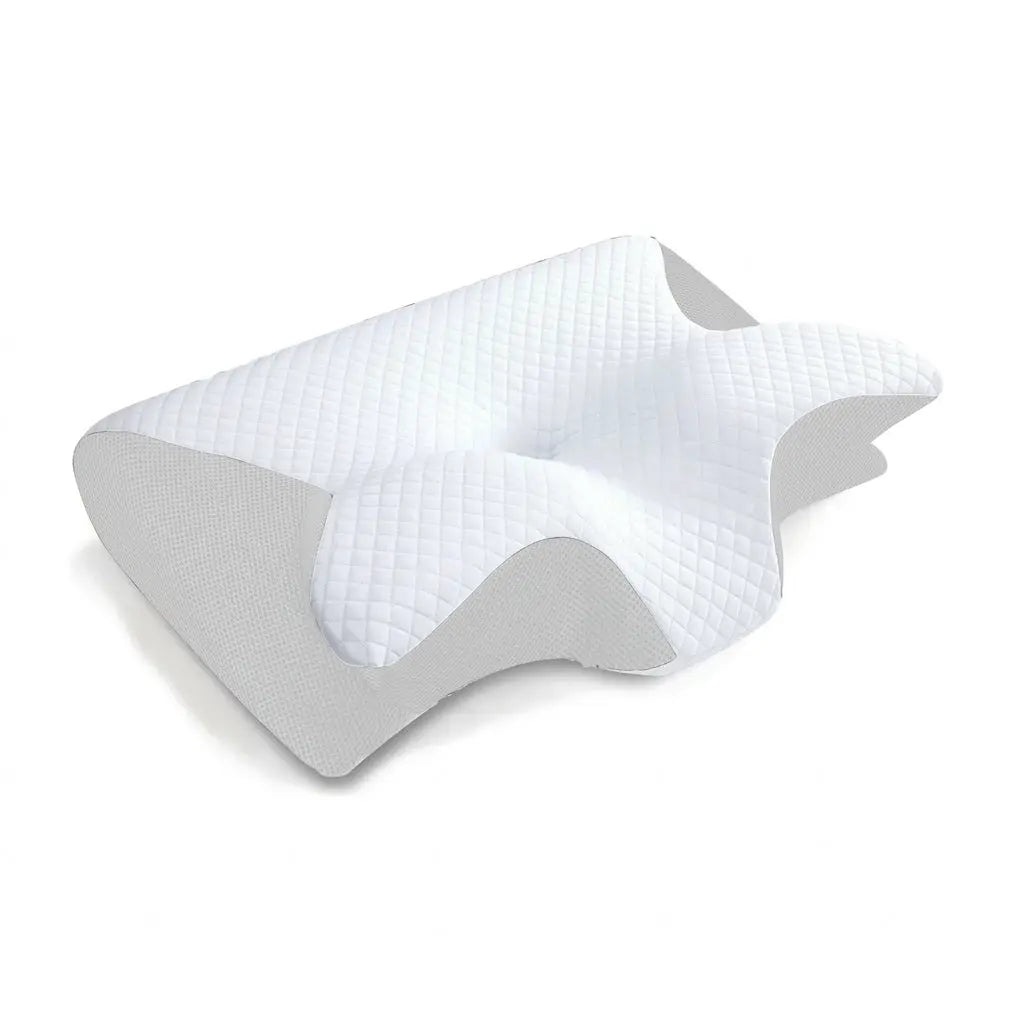 White cervical memory foam pillow front view on linen bedding