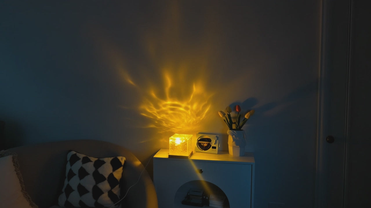 Water ripple lamp cycling through color modes in a dark bedroom