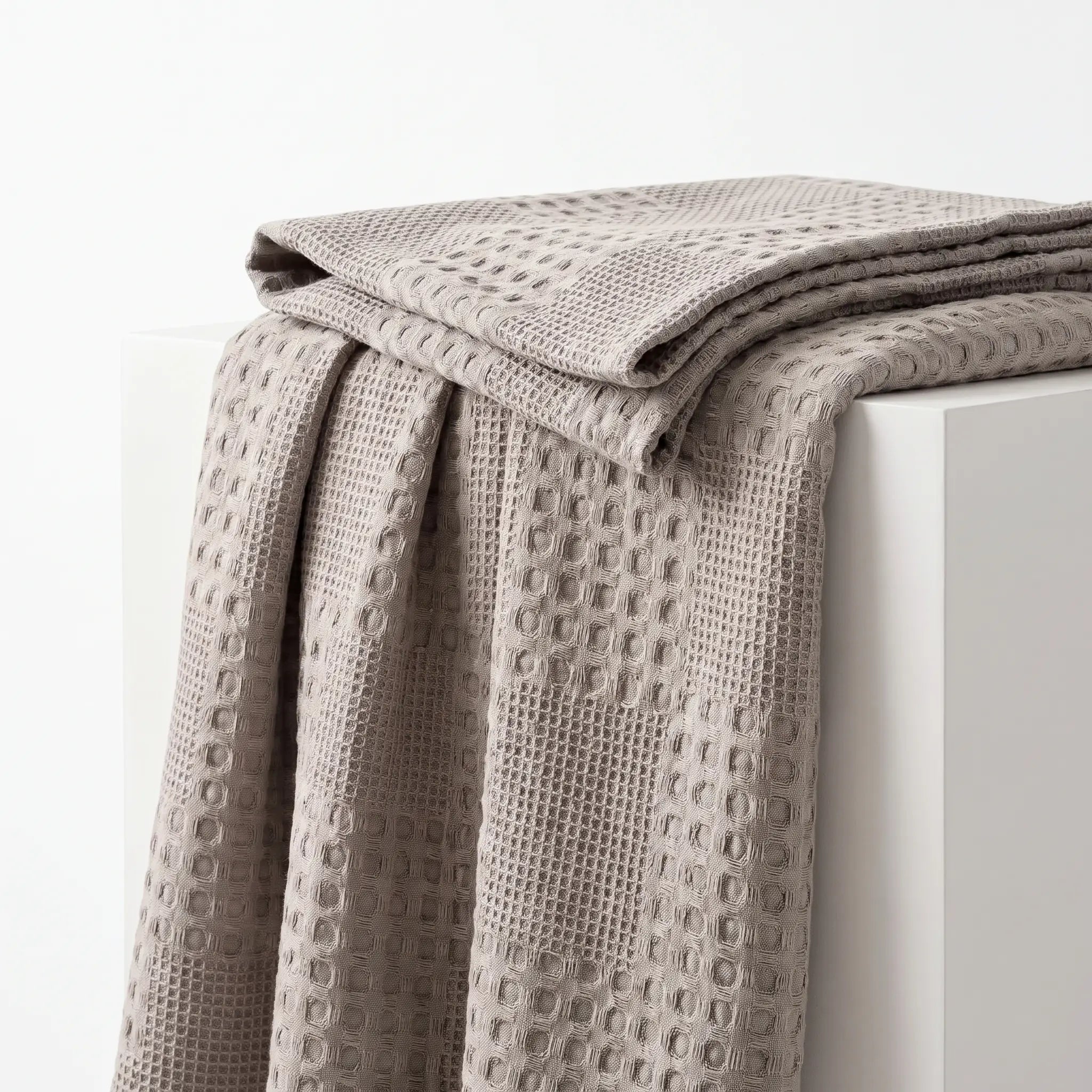 Waffle Weave Cotton Blanket folded to show its thickness and drape