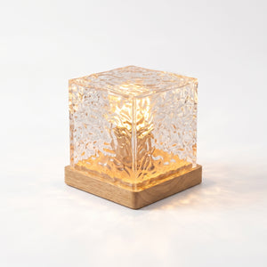 Water Ripple Projection Lamp – clear acrylic cube on wood base, studio shot